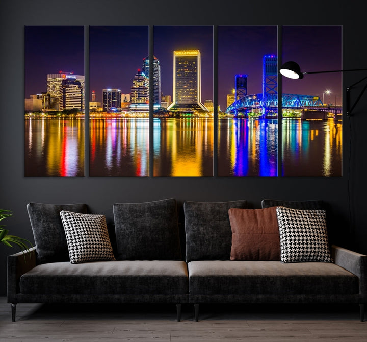 The Jacksonville City cityscape wall art captures a vibrant city skyline at night with colorful reflections in the water and is elegantly displayed on museum-quality gallery wrapped canvas.