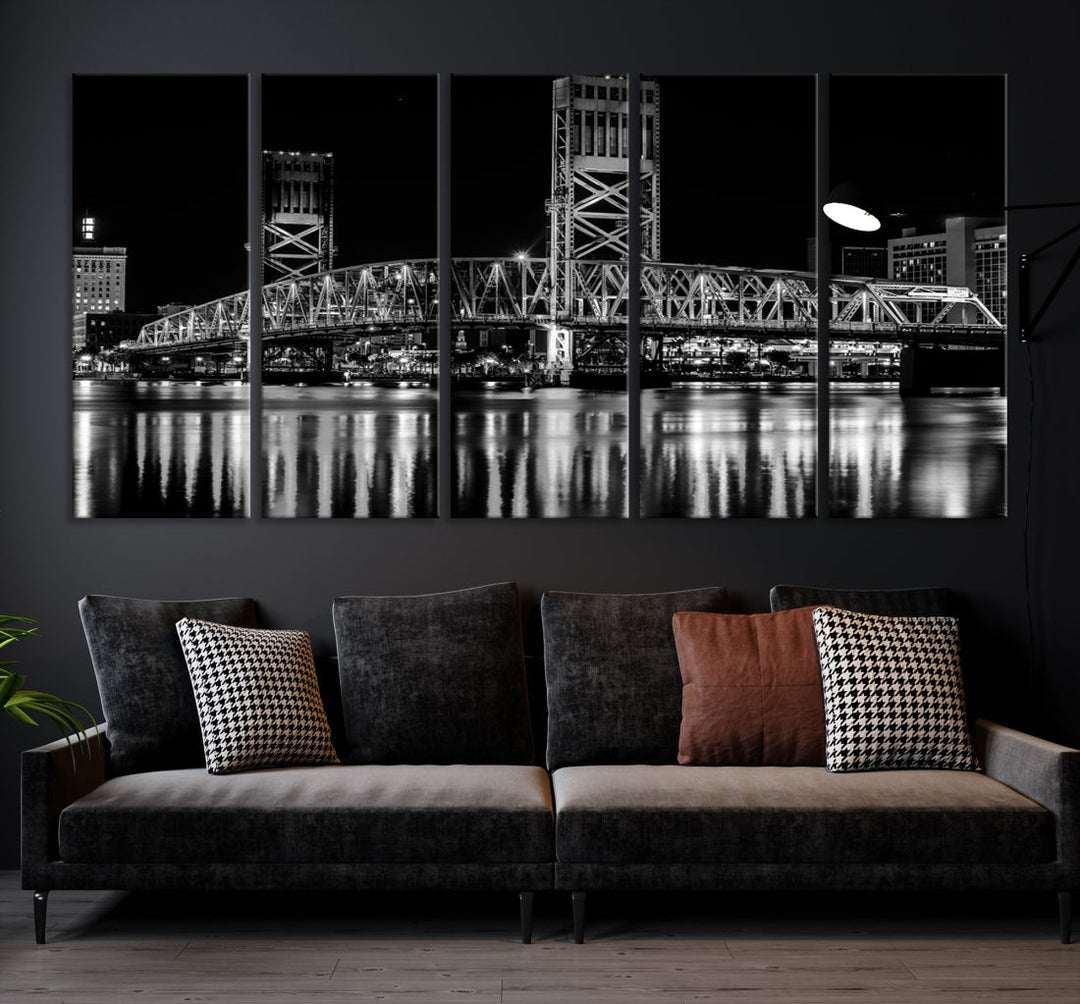 The Jacksonville City Bridge Night Wall Art Canvas Print is a black and white triptych depicting the city bridge at night. It features a UV-protective coating on museum-quality canvas.