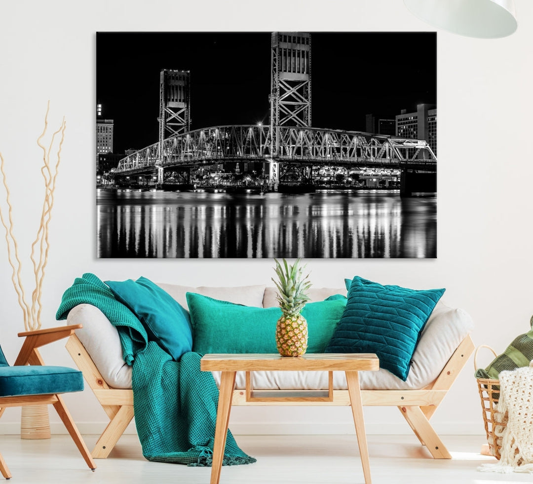 The Jacksonville City Bridge Night Wall Art Canvas Print is a black and white triptych depicting the city bridge at night. It features a UV-protective coating on museum-quality canvas.