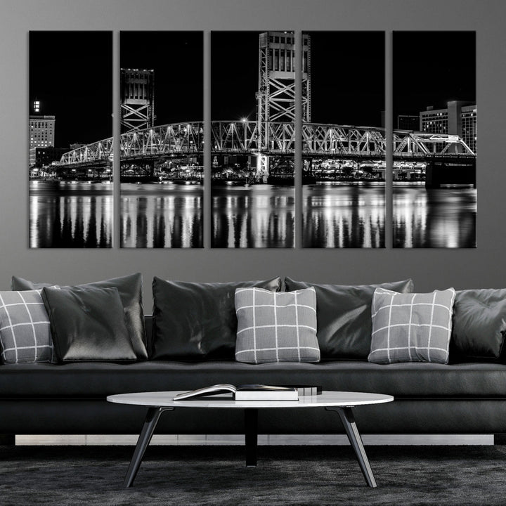 The Jacksonville City Bridge Night Wall Art Canvas Print is a black and white triptych depicting the city bridge at night. It features a UV-protective coating on museum-quality canvas.