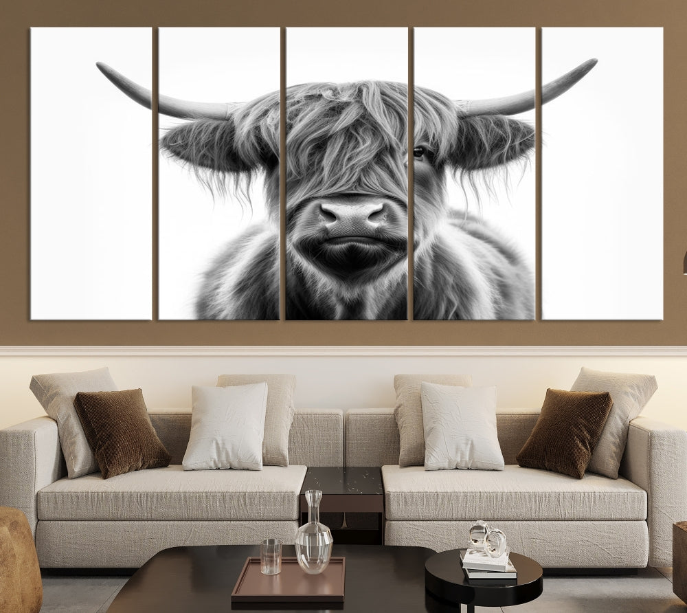 A three-panel wall art from the Highland Cow Animal Canvas series showcases a long-haired, large-horned cow. This Texas Cattle Art Print is crafted on museum-quality canvas with a UV-protective coating, making it an ideal addition to transform your living room.