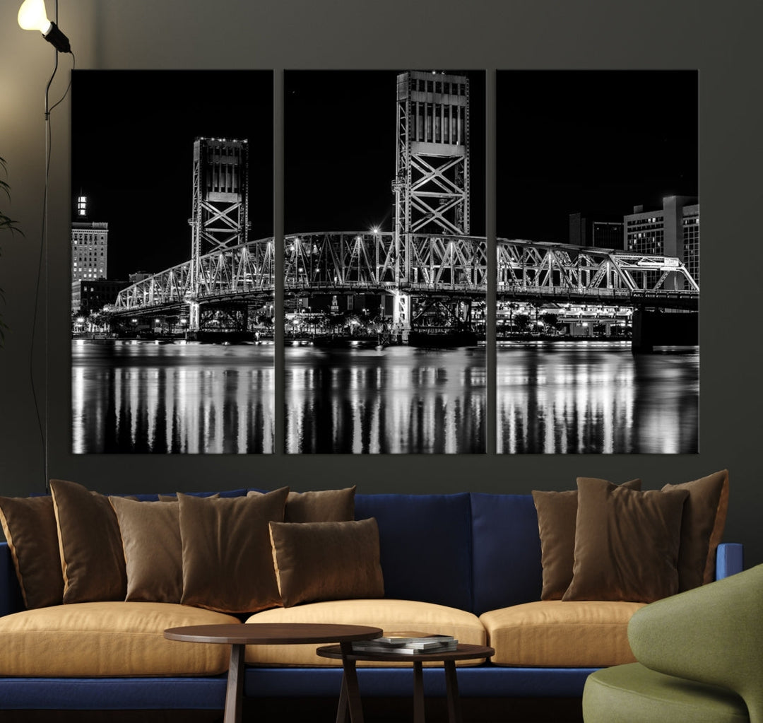 The Jacksonville City Bridge Night Wall Art Canvas Print is a black and white triptych depicting the city bridge at night. It features a UV-protective coating on museum-quality canvas.