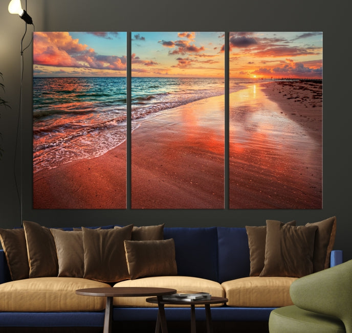 The "Beach and Red Sunset Wall Art Canvas Print" features a triptych of a vibrant beach sunset. These museum-quality canvases come with a UV-protective coating and are ready to hang, offering an instant touch of elegance.