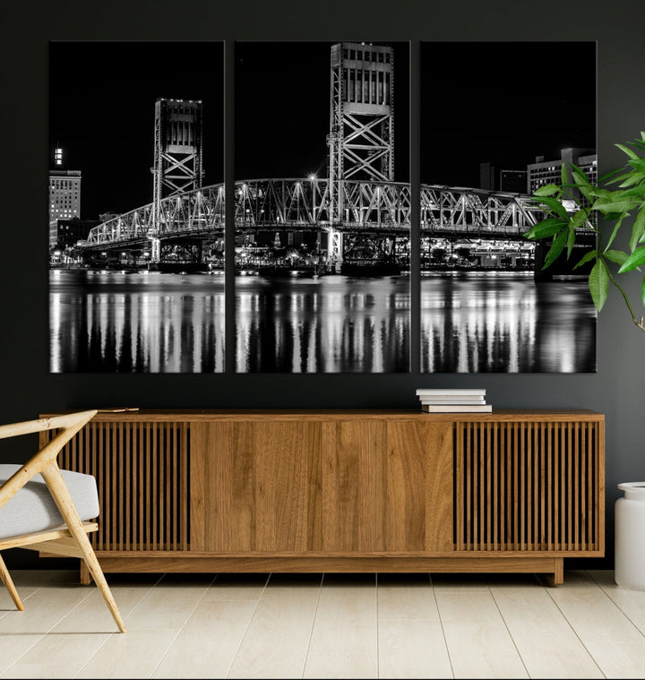 The Jacksonville City Bridge Night Wall Art Canvas Print is a black and white triptych depicting the city bridge at night. It features a UV-protective coating on museum-quality canvas.