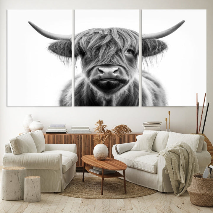 A three-panel wall art from the Highland Cow Animal Canvas series showcases a long-haired, large-horned cow. This Texas Cattle Art Print is crafted on museum-quality canvas with a UV-protective coating, making it an ideal addition to transform your living room.