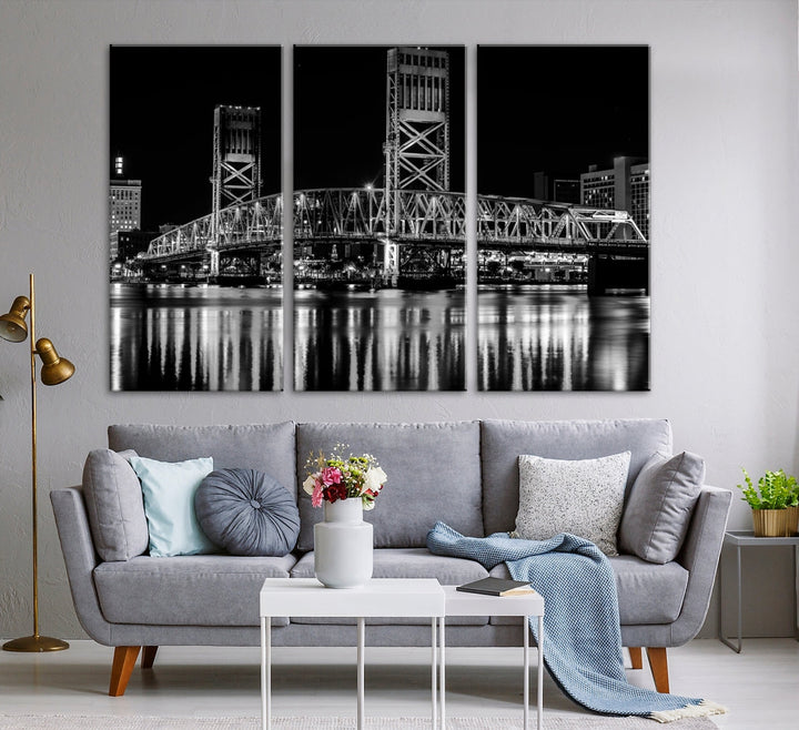 The Jacksonville City Bridge Night Wall Art Canvas Print is a black and white triptych depicting the city bridge at night. It features a UV-protective coating on museum-quality canvas.