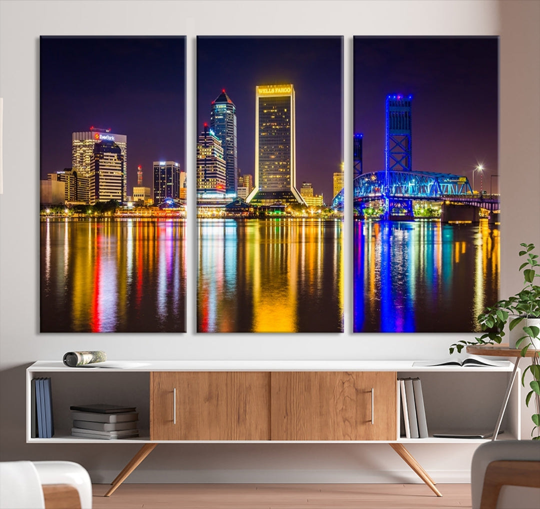 The Jacksonville City cityscape wall art captures a vibrant city skyline at night with colorful reflections in the water and is elegantly displayed on museum-quality gallery wrapped canvas.