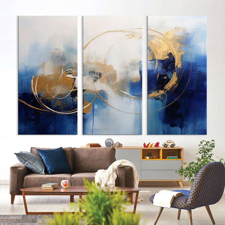 The Navy Blue Abstract Wall Art Canvas Print, featuring a UV-protective coating and a ready-to-hang design, enhances the living room wall. Crafted on museum-quality canvas, its vibrant hues ensure enduring brilliance.