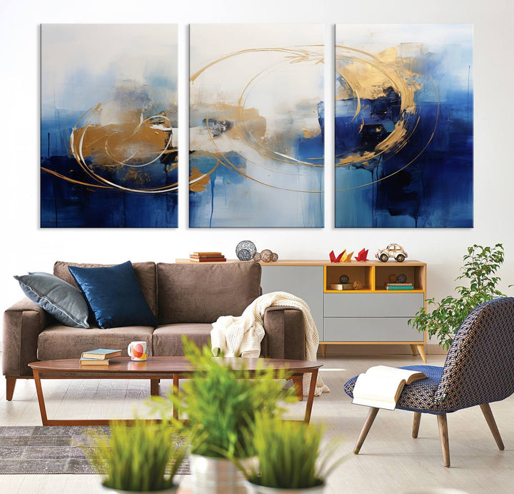 The Navy Blue Abstract Wall Art Canvas Print, featuring a UV-protective coating and a ready-to-hang design, enhances the living room wall. Crafted on museum-quality canvas, its vibrant hues ensure enduring brilliance.