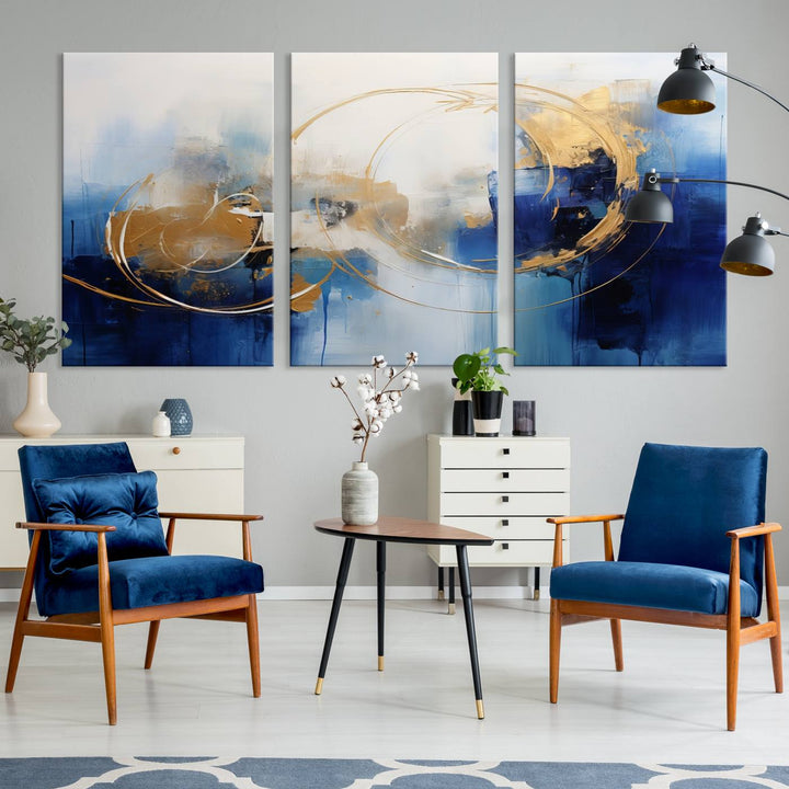 The Navy Blue Abstract Wall Art Canvas Print, featuring a UV-protective coating and a ready-to-hang design, enhances the living room wall. Crafted on museum-quality canvas, its vibrant hues ensure enduring brilliance.