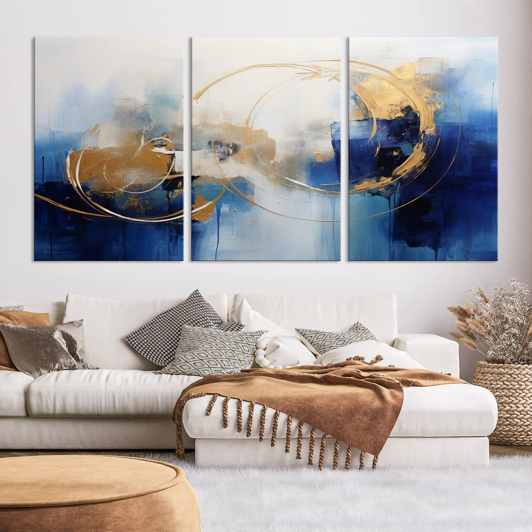 The Navy Blue Abstract Wall Art Canvas Print, featuring a UV-protective coating and a ready-to-hang design, enhances the living room wall. Crafted on museum-quality canvas, its vibrant hues ensure enduring brilliance.