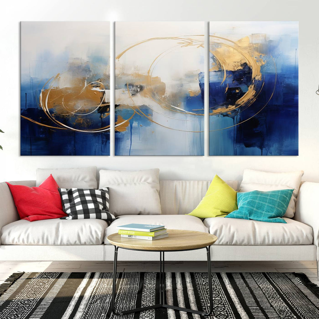 The Navy Blue Abstract Wall Art Canvas Print, featuring a UV-protective coating and a ready-to-hang design, enhances the living room wall. Crafted on museum-quality canvas, its vibrant hues ensure enduring brilliance.