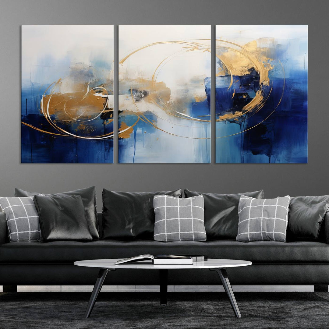 The Navy Blue Abstract Wall Art Canvas Print, featuring a UV-protective coating and a ready-to-hang design, enhances the living room wall. Crafted on museum-quality canvas, its vibrant hues ensure enduring brilliance.