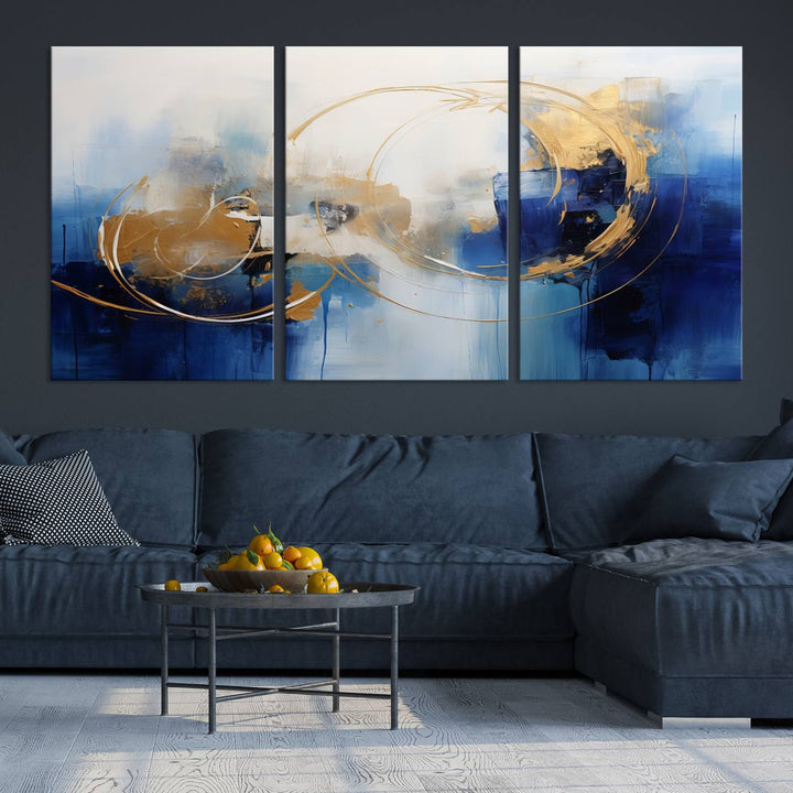 The Navy Blue Abstract Wall Art Canvas Print, featuring a UV-protective coating and a ready-to-hang design, enhances the living room wall. Crafted on museum-quality canvas, its vibrant hues ensure enduring brilliance.