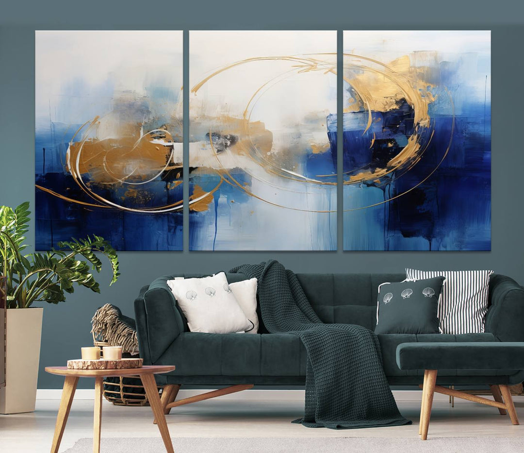 The Navy Blue Abstract Wall Art Canvas Print, featuring a UV-protective coating and a ready-to-hang design, enhances the living room wall. Crafted on museum-quality canvas, its vibrant hues ensure enduring brilliance.