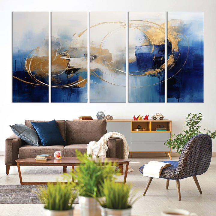 The Navy Blue Abstract Wall Art Canvas Print, featuring a UV-protective coating and a ready-to-hang design, enhances the living room wall. Crafted on museum-quality canvas, its vibrant hues ensure enduring brilliance.