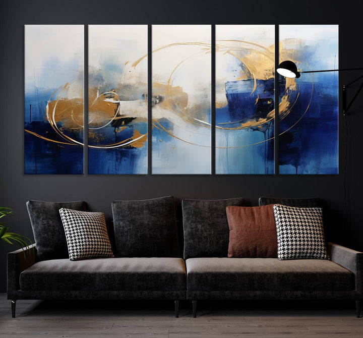 The Navy Blue Abstract Wall Art Canvas Print, featuring a UV-protective coating and a ready-to-hang design, enhances the living room wall. Crafted on museum-quality canvas, its vibrant hues ensure enduring brilliance.