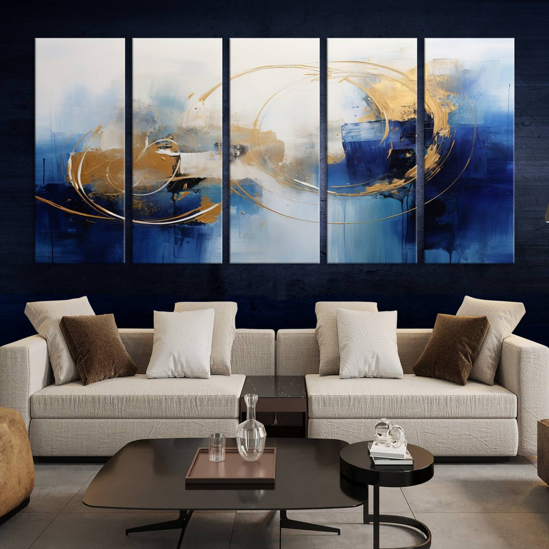 The Navy Blue Abstract Wall Art Canvas Print, featuring a UV-protective coating and a ready-to-hang design, enhances the living room wall. Crafted on museum-quality canvas, its vibrant hues ensure enduring brilliance.