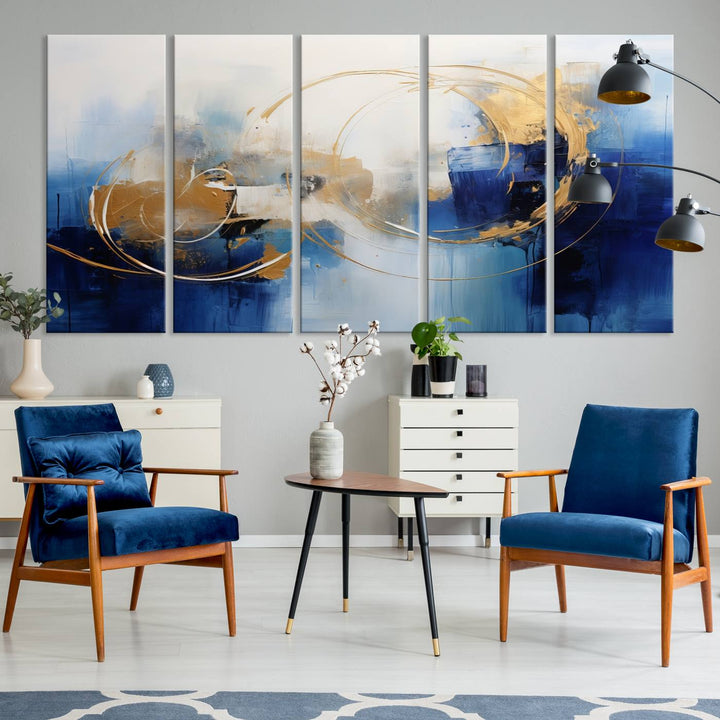 The Navy Blue Abstract Wall Art Canvas Print, featuring a UV-protective coating and a ready-to-hang design, enhances the living room wall. Crafted on museum-quality canvas, its vibrant hues ensure enduring brilliance.