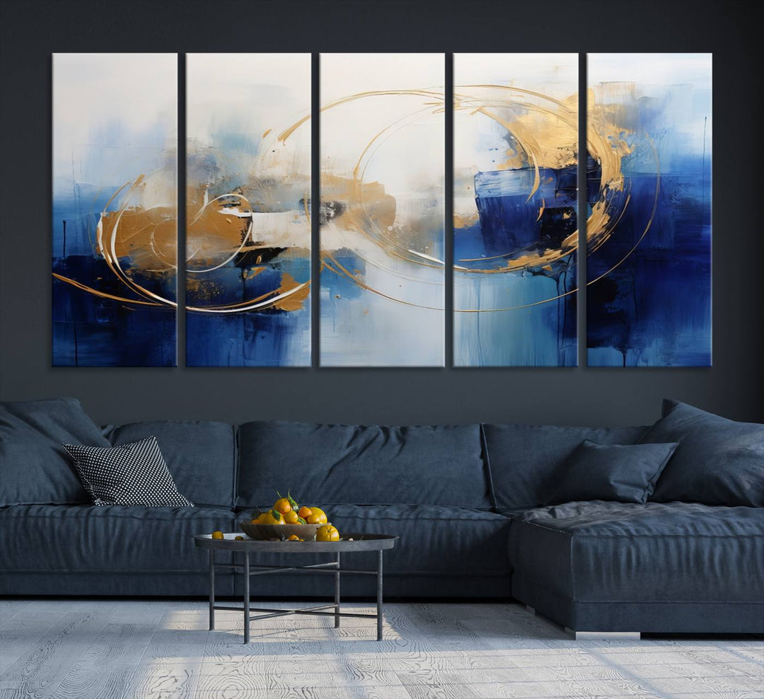 The Navy Blue Abstract Wall Art Canvas Print, featuring a UV-protective coating and a ready-to-hang design, enhances the living room wall. Crafted on museum-quality canvas, its vibrant hues ensure enduring brilliance.