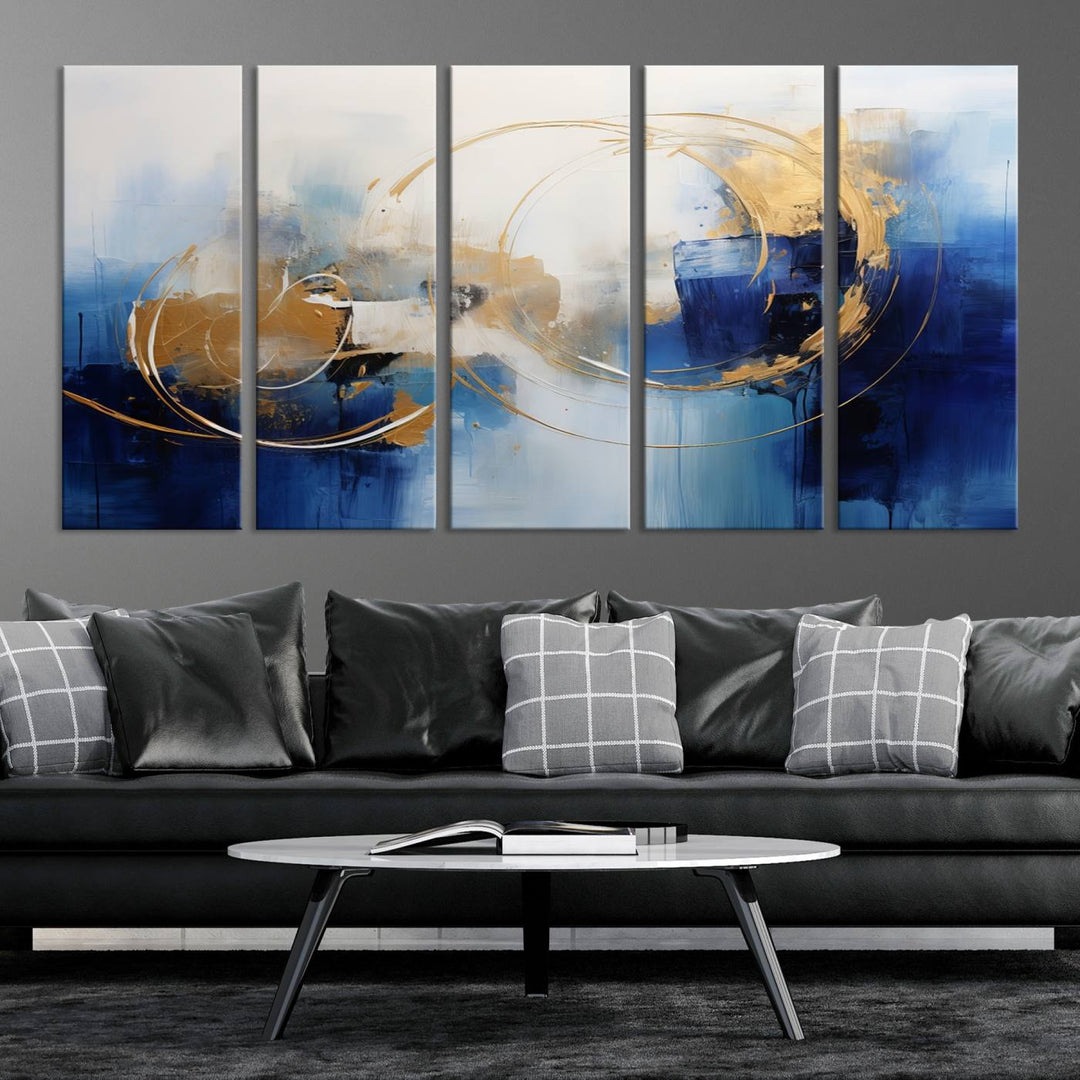 The Navy Blue Abstract Wall Art Canvas Print, featuring a UV-protective coating and a ready-to-hang design, enhances the living room wall. Crafted on museum-quality canvas, its vibrant hues ensure enduring brilliance.