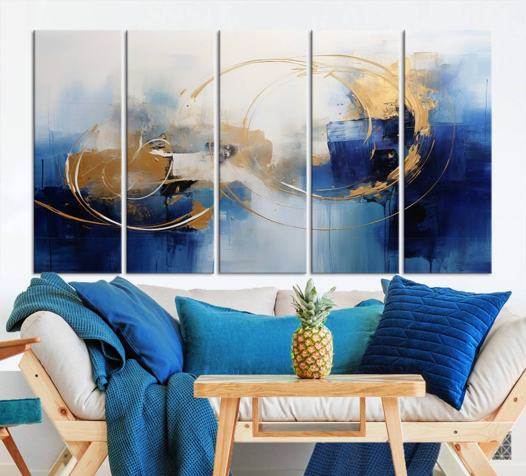 The Navy Blue Abstract Wall Art Canvas Print, featuring a UV-protective coating and a ready-to-hang design, enhances the living room wall. Crafted on museum-quality canvas, its vibrant hues ensure enduring brilliance.