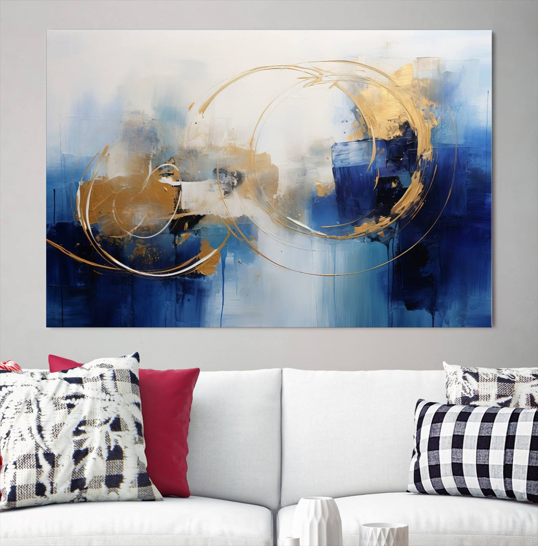 The Navy Blue Abstract Wall Art Canvas Print, featuring a UV-protective coating and a ready-to-hang design, enhances the living room wall. Crafted on museum-quality canvas, its vibrant hues ensure enduring brilliance.