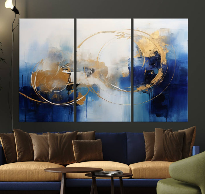 The Navy Blue Abstract Wall Art Canvas Print, featuring a UV-protective coating and a ready-to-hang design, enhances the living room wall. Crafted on museum-quality canvas, its vibrant hues ensure enduring brilliance.