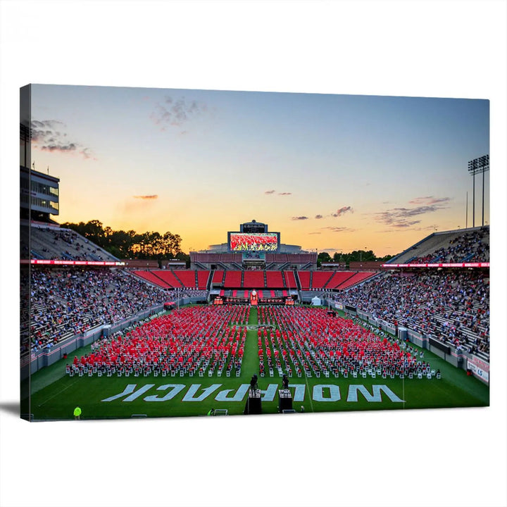 The wall art in the living room features the NC State Wolfpack Football Team Print, beautifully depicting Raleigh's Carter-Finley Stadium at sunset with a crowd dressed in red uniforms. Its gallery-quality finish on premium canvas transforms the scene into captivating artwork.