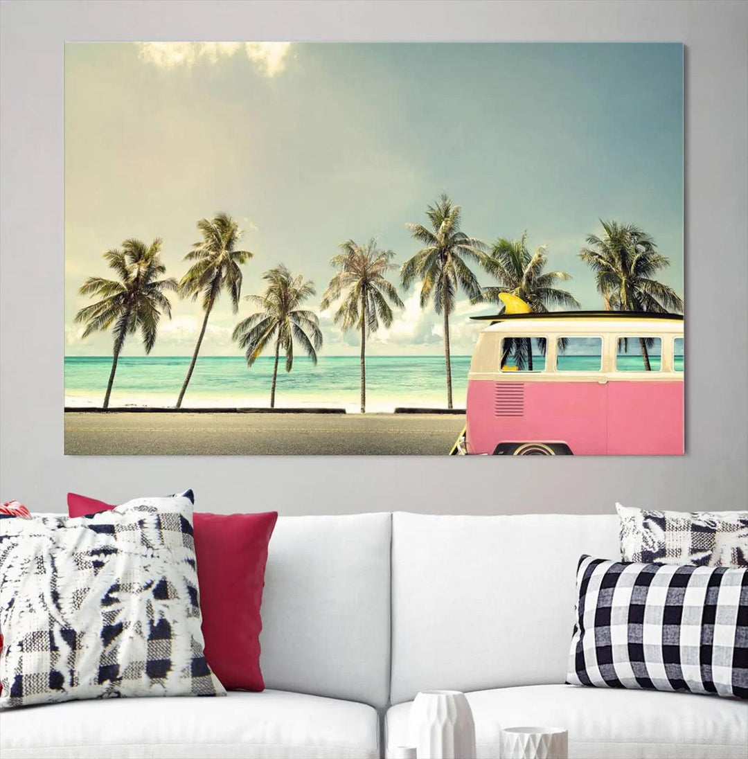 The Nostalgia Lovely Summer Day Canvas Wall Art Print in the modern living room showcases a tropical triptych with palm trees and a vintage van on museum-quality canvases, ready to hang.