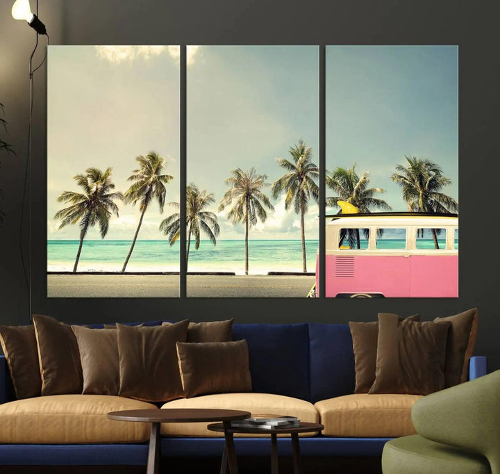 The Nostalgia Lovely Summer Day Canvas Wall Art Print in the modern living room showcases a tropical triptych with palm trees and a vintage van on museum-quality canvases, ready to hang.