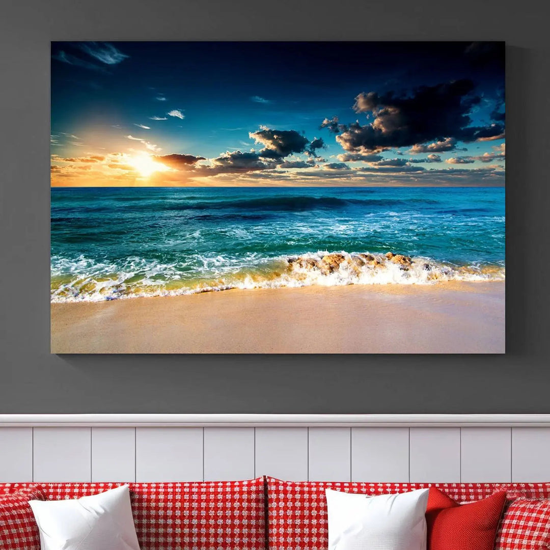 The Ocean Breeze Beach Sunset Wall Art Canvas Print—a captivating triptych of a beach sunset—adds a stunning coastal charm to the room, making it ideal for home or cabin decor.