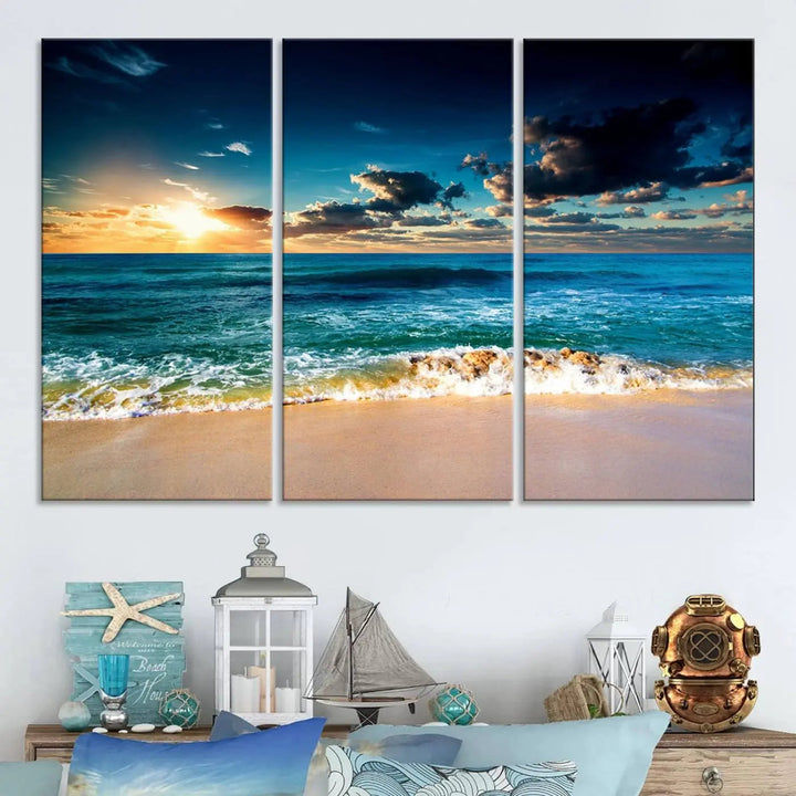 The Ocean Breeze Beach Sunset Wall Art Canvas Print—a captivating triptych of a beach sunset—adds a stunning coastal charm to the room, making it ideal for home or cabin decor.