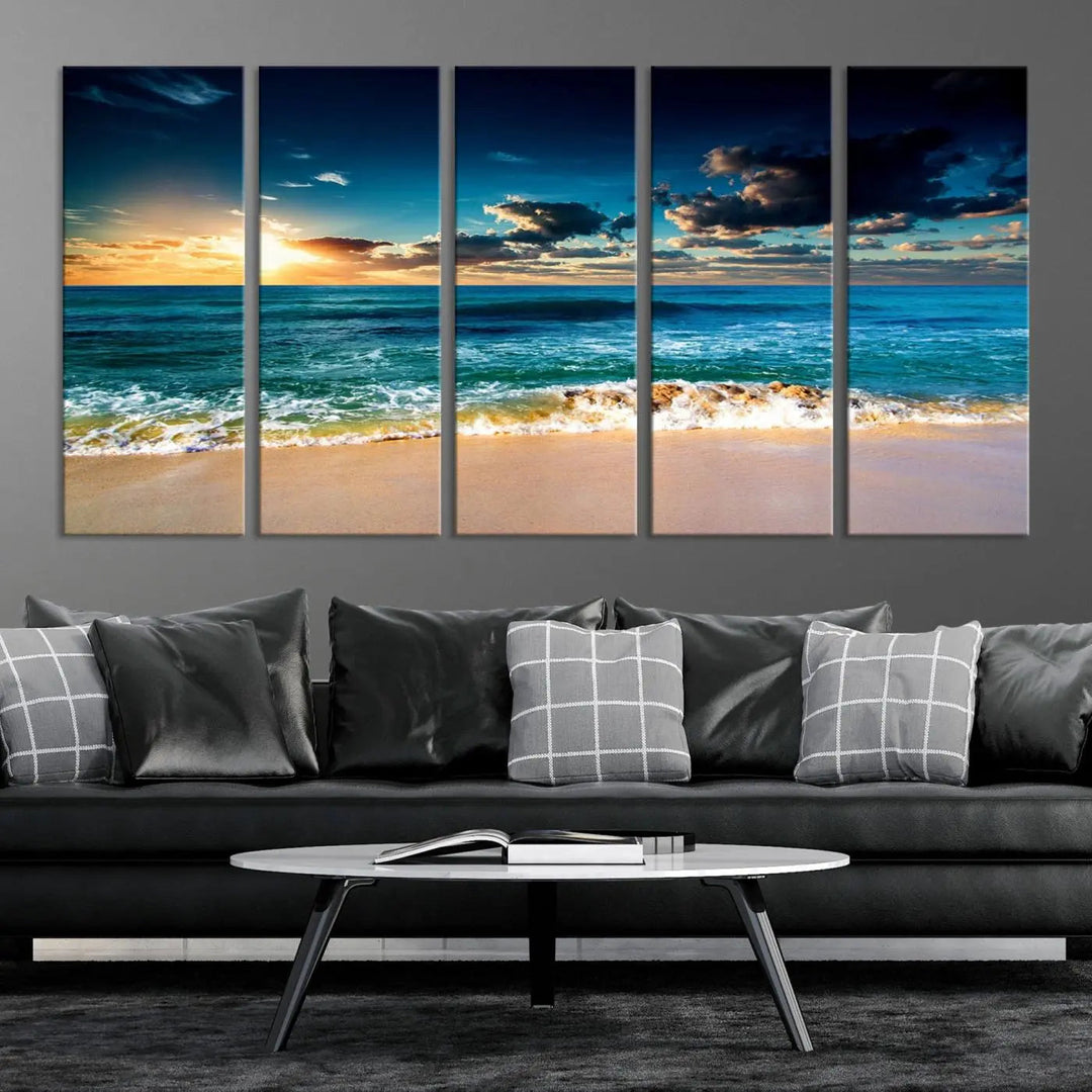 The Ocean Breeze Beach Sunset Wall Art Canvas Print—a captivating triptych of a beach sunset—adds a stunning coastal charm to the room, making it ideal for home or cabin decor.