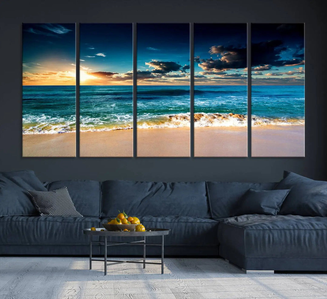 The Ocean Breeze Beach Sunset Wall Art Canvas Print—a captivating triptych of a beach sunset—adds a stunning coastal charm to the room, making it ideal for home or cabin decor.