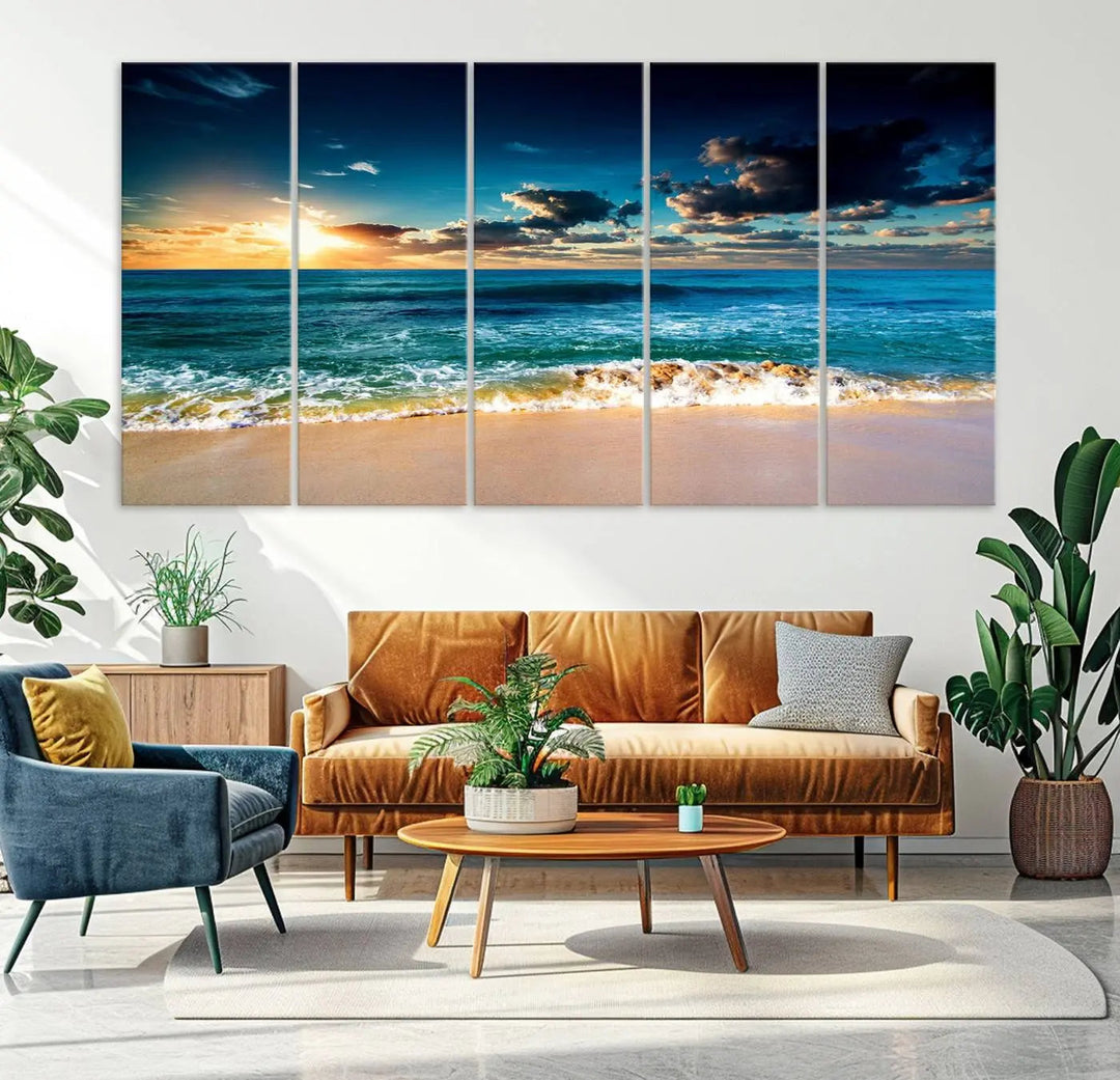 The Ocean Breeze Beach Sunset Wall Art Canvas Print—a captivating triptych of a beach sunset—adds a stunning coastal charm to the room, making it ideal for home or cabin decor.