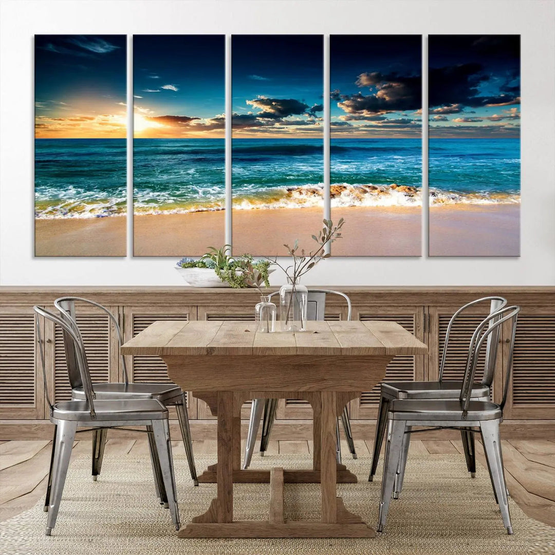 The Ocean Breeze Beach Sunset Wall Art Canvas Print—a captivating triptych of a beach sunset—adds a stunning coastal charm to the room, making it ideal for home or cabin decor.