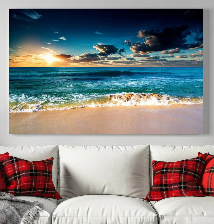 The Ocean Breeze Beach Sunset Wall Art Canvas Print—a captivating triptych of a beach sunset—adds a stunning coastal charm to the room, making it ideal for home or cabin decor.