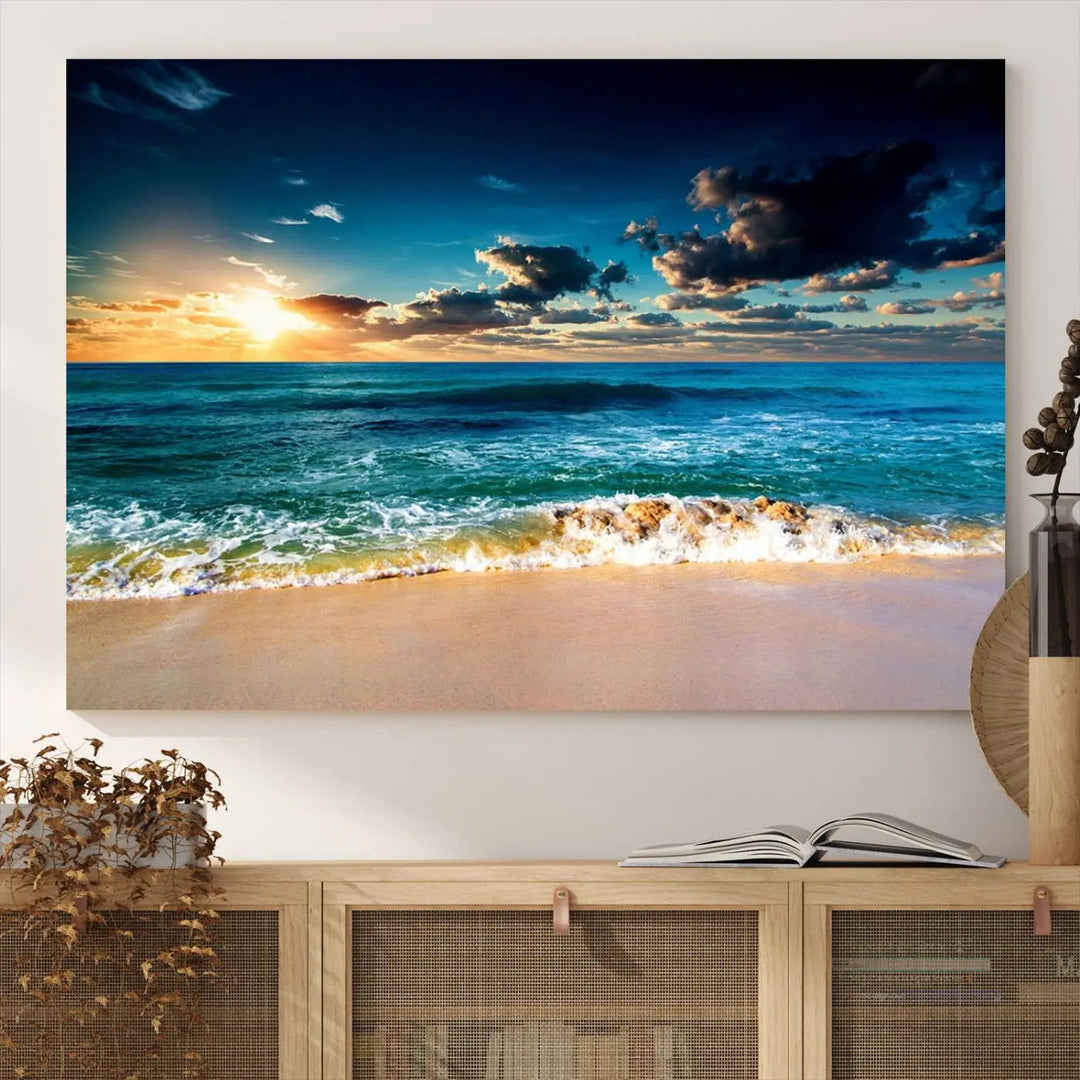 The Ocean Breeze Beach Sunset Wall Art Canvas Print—a captivating triptych of a beach sunset—adds a stunning coastal charm to the room, making it ideal for home or cabin decor.