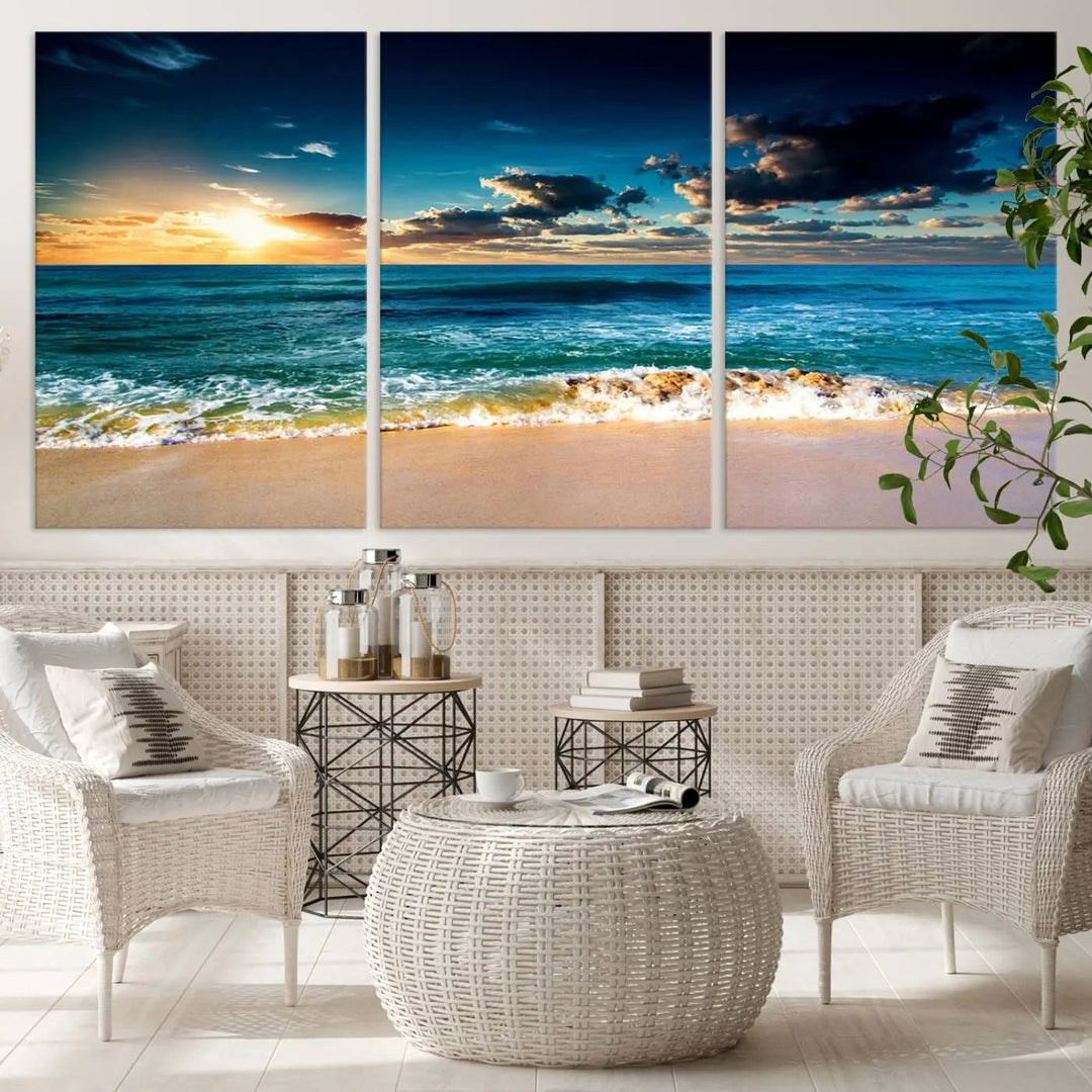 The Ocean Breeze Beach Sunset Wall Art Canvas Print—a captivating triptych of a beach sunset—adds a stunning coastal charm to the room, making it ideal for home or cabin decor.