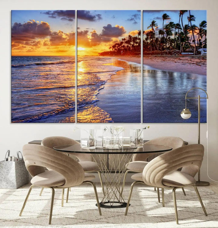 The dining area features a stunning Ocean Sunset Beach Canvas Print—a five-panel coastal wall art and tropical seascape triptych that beautifully captures the serene beauty of ocean waves set against a beach sunset scene.