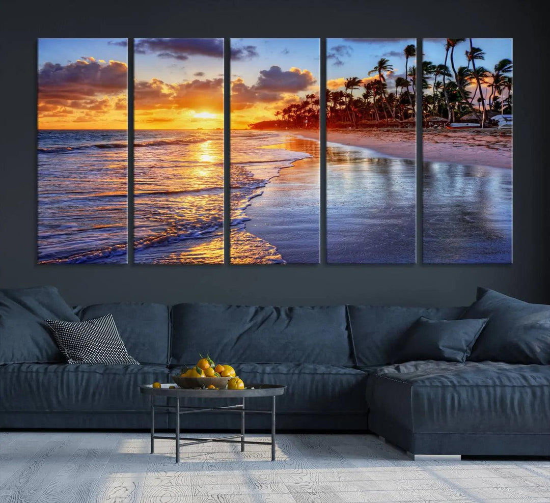 The dining area features a stunning Ocean Sunset Beach Canvas Print—a five-panel coastal wall art and tropical seascape triptych that beautifully captures the serene beauty of ocean waves set against a beach sunset scene.