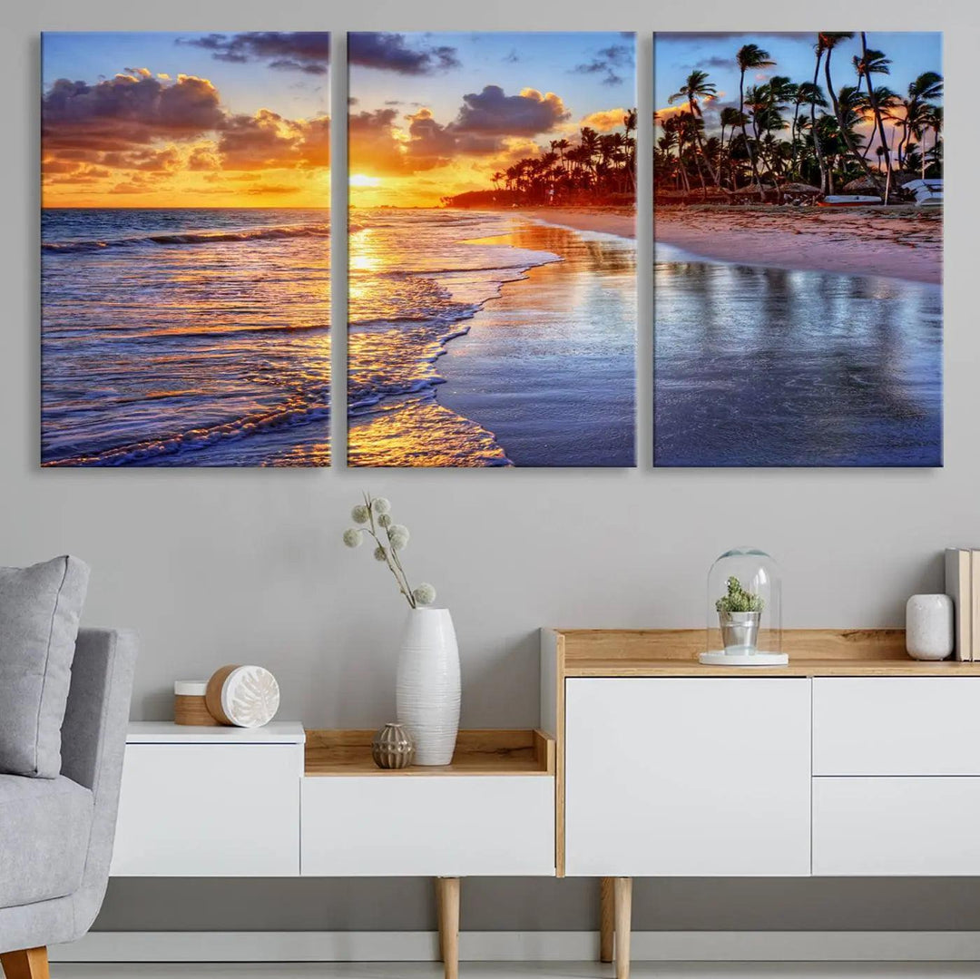 The dining area features a stunning Ocean Sunset Beach Canvas Print—a five-panel coastal wall art and tropical seascape triptych that beautifully captures the serene beauty of ocean waves set against a beach sunset scene.