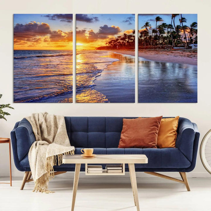 The dining area features a stunning Ocean Sunset Beach Canvas Print—a five-panel coastal wall art and tropical seascape triptych that beautifully captures the serene beauty of ocean waves set against a beach sunset scene.