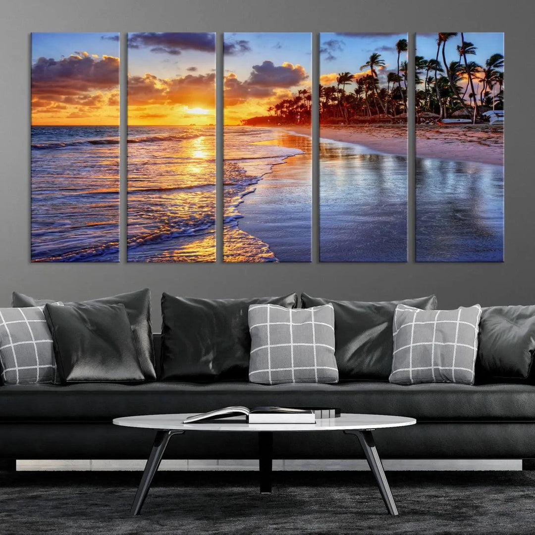 The dining area features a stunning Ocean Sunset Beach Canvas Print—a five-panel coastal wall art and tropical seascape triptych that beautifully captures the serene beauty of ocean waves set against a beach sunset scene.