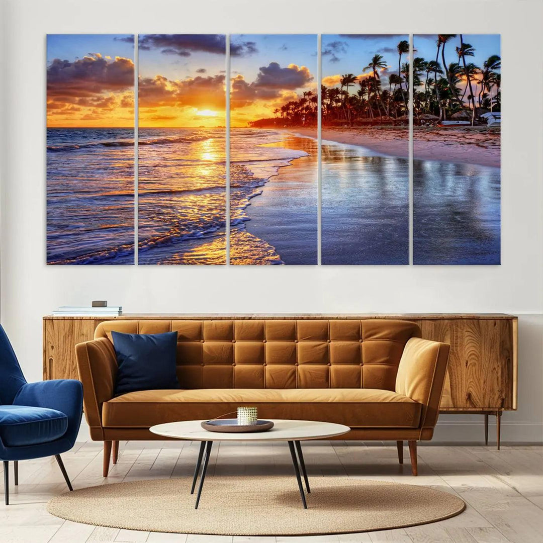 The dining area features a stunning Ocean Sunset Beach Canvas Print—a five-panel coastal wall art and tropical seascape triptych that beautifully captures the serene beauty of ocean waves set against a beach sunset scene.