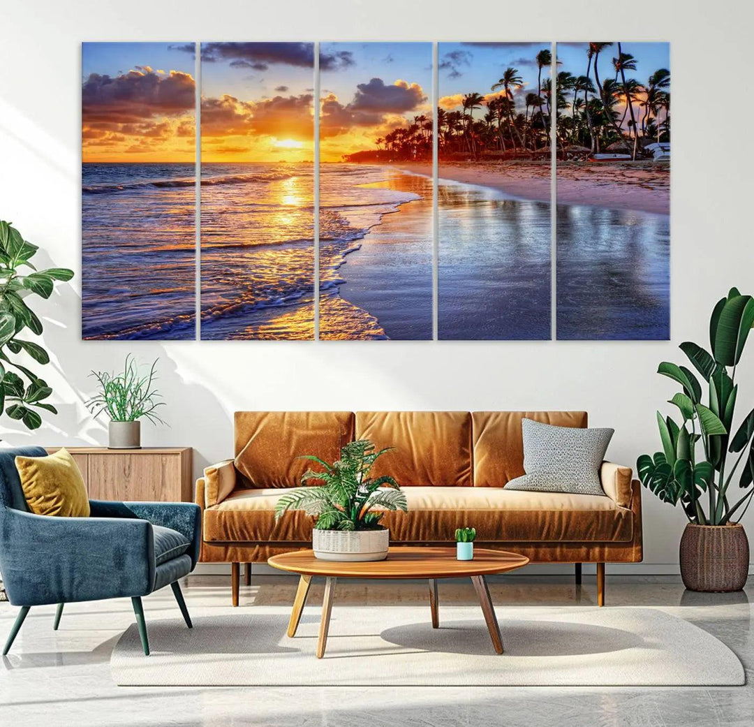 The dining area features a stunning Ocean Sunset Beach Canvas Print—a five-panel coastal wall art and tropical seascape triptych that beautifully captures the serene beauty of ocean waves set against a beach sunset scene.