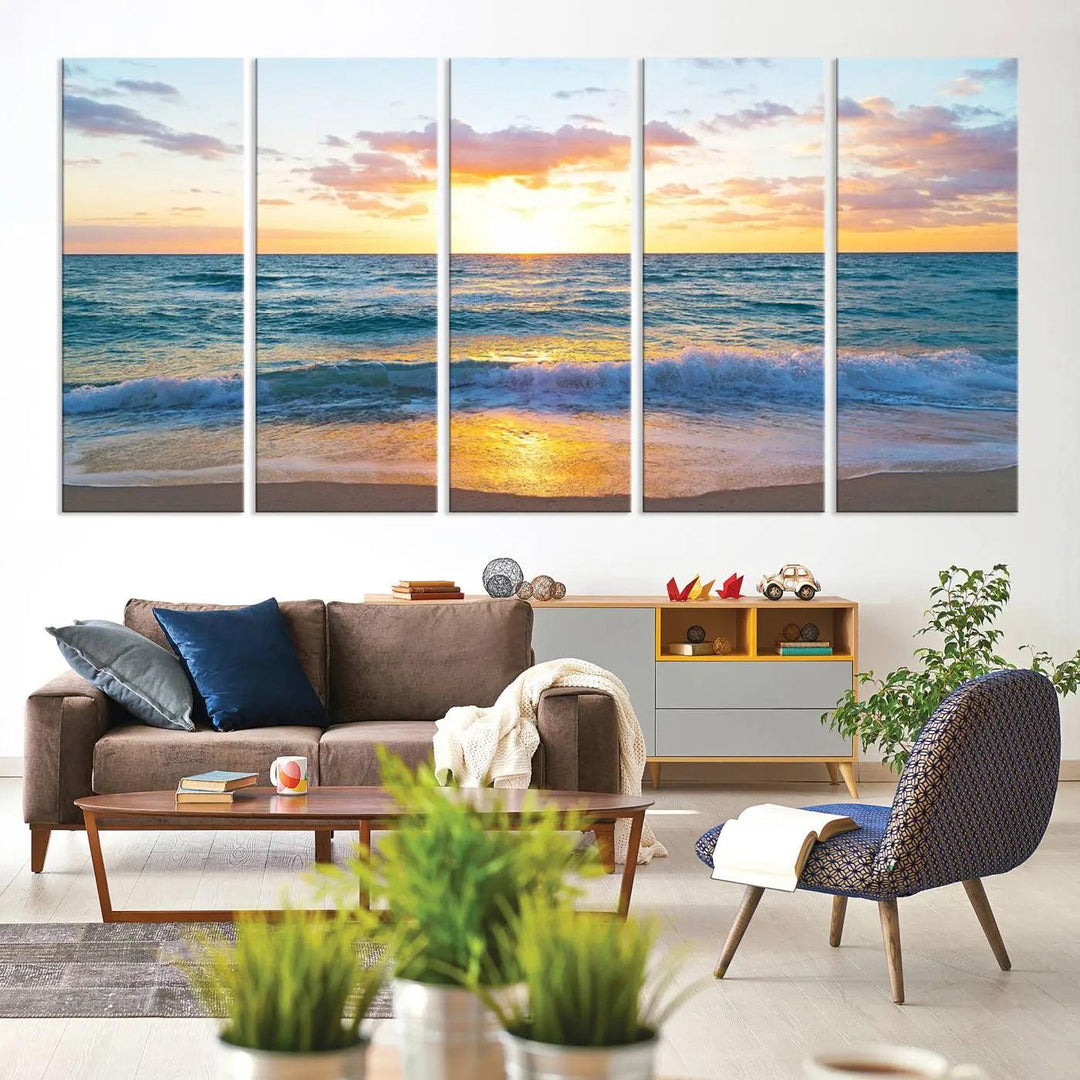 An Ocean Sunset Triptych Canvas Wall Art featuring a Giclee Beach Sunset Print with Gentle Waves is displayed on a wooden wall, creating a tranquil coastal vibe.