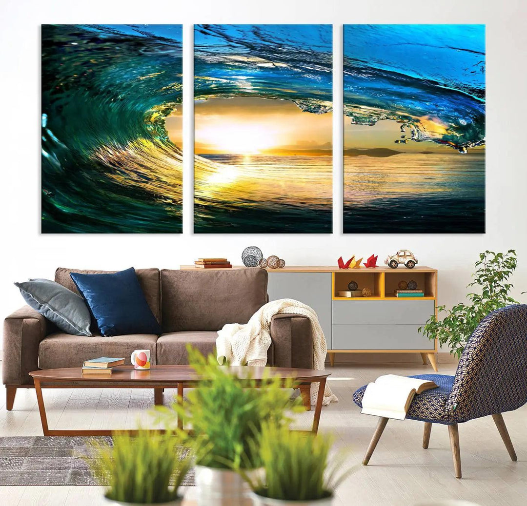 A modern dining room with a coastal vibe showcases a striking large wall print, the "Ocean Wave at Sunset Canvas Art," depicting vibrant water waves. The room features abstract wave artwork on the walls. This eye-catching piece of coastal art infuses the space with seaside serenity.