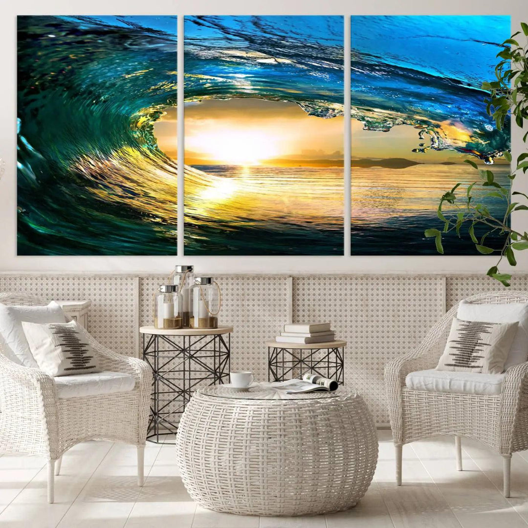 A modern dining room with a coastal vibe showcases a striking large wall print, the "Ocean Wave at Sunset Canvas Art," depicting vibrant water waves. The room features abstract wave artwork on the walls. This eye-catching piece of coastal art infuses the space with seaside serenity.